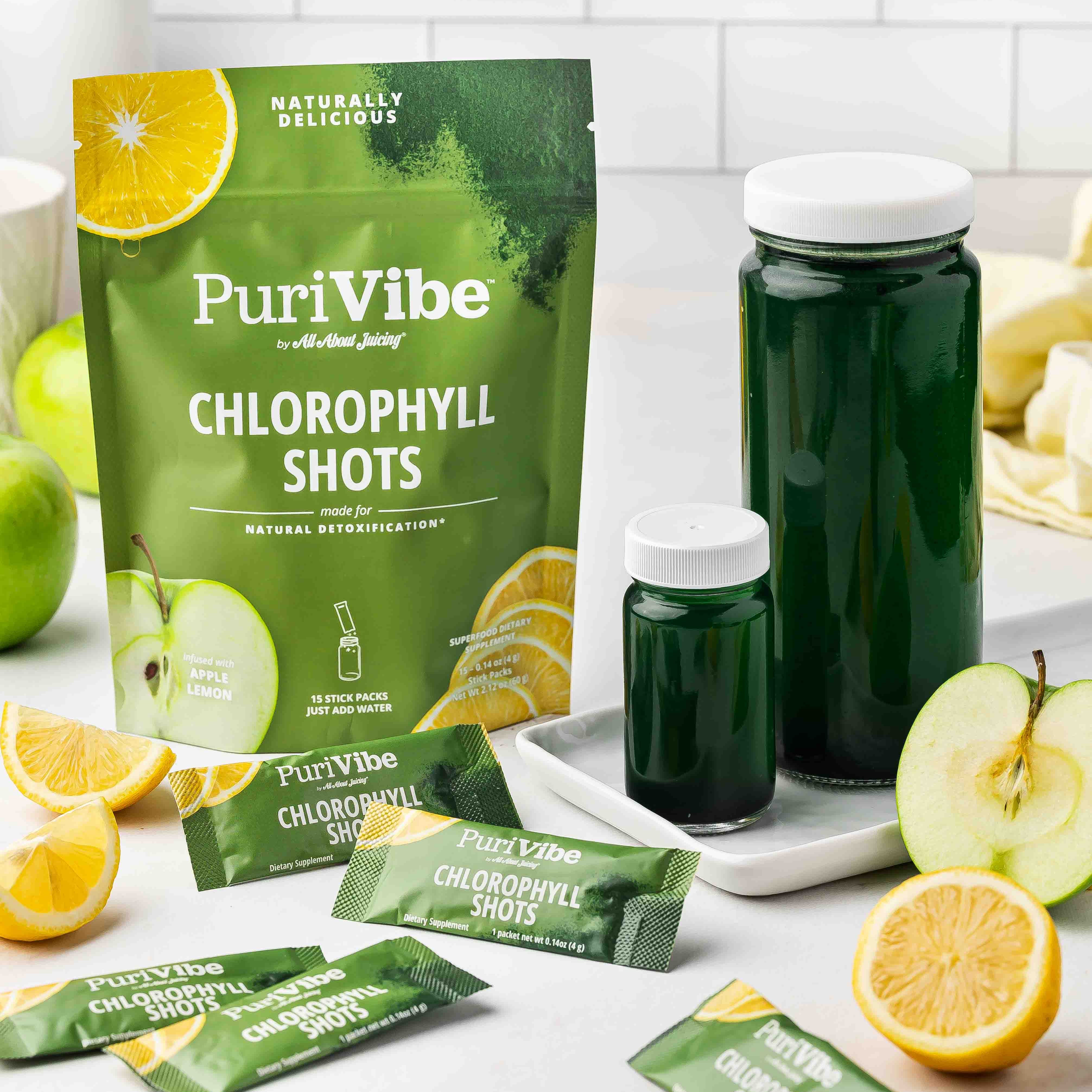 PuriVibe Chlorophyll Shots packaging with green juice and fruits on a white surface.